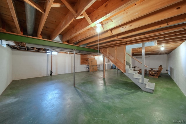 608 Brook St, Tecumseh, MI 49286 - unfinished basement featuring stairs and washer / dryer
