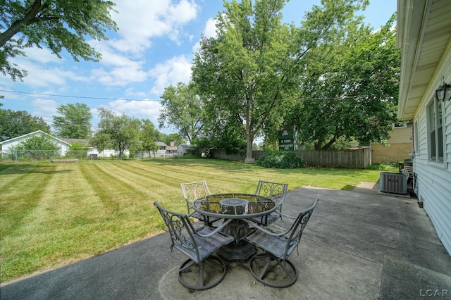 608 Brook St, Tecumseh, MI 49286 - fenced backyard featuring a patio area and outdoor dining space