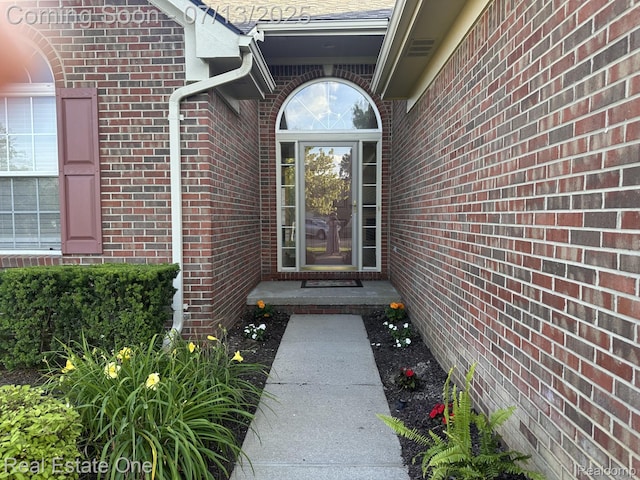 820 Woodhaven Dr, Commerce Twp, MI 48390 - property entrance with brick siding