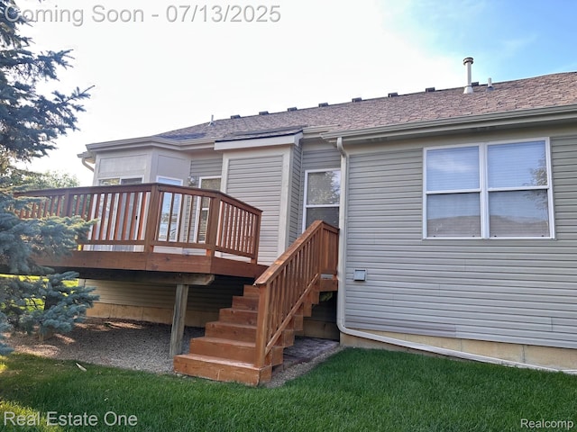 820 Woodhaven Dr, Commerce Twp, MI 48390 - rear view of property with a deck and stairway