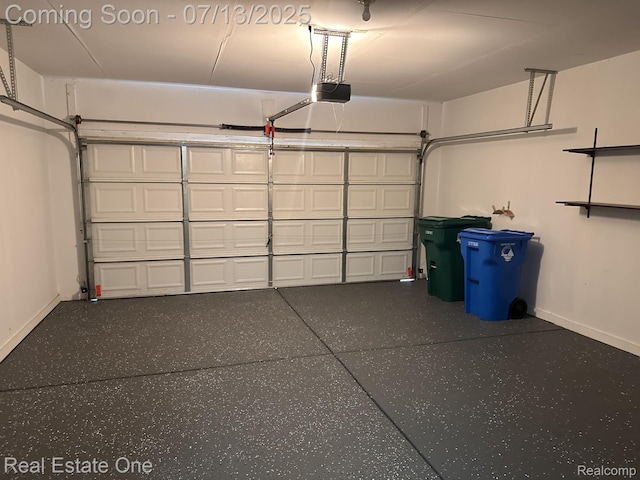 820 Woodhaven Dr, Commerce Twp, MI 48390 - garage featuring a garage door opener and baseboards
