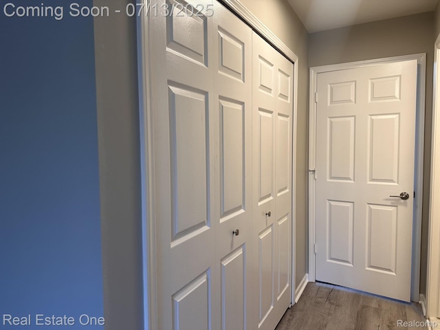 820 Woodhaven Dr, Commerce Twp, MI 48390 - corridor featuring dark wood-style floors