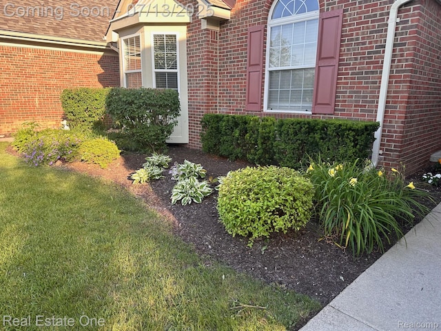 820 Woodhaven Dr, Commerce Twp, MI 48390 - entrance to property with brick siding and a yard