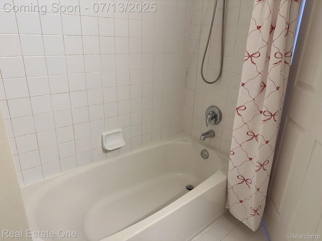 820 Woodhaven Dr, Commerce Twp, MI 48390 - bathroom featuring tile patterned flooring and shower / bath combination with curtain