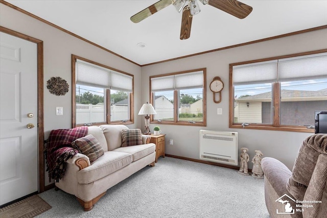 15930 Drysdale St, Southgate, MI 48195 - living area with heating unit, light colored carpet, a ceiling fan, and crown molding