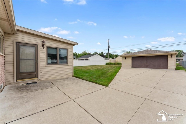 15930 Drysdale St, Southgate, MI 48195 - view of patio with a garage and an outbuilding