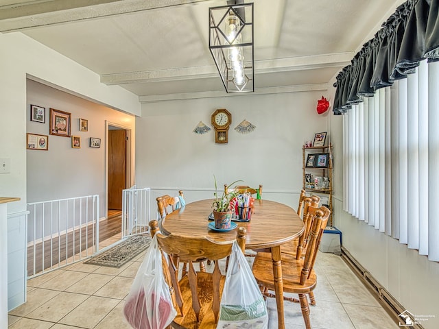 1405 Arbor Ave, Monroe, MI 48162 - dining area featuring light tile patterned floors and baseboard heating