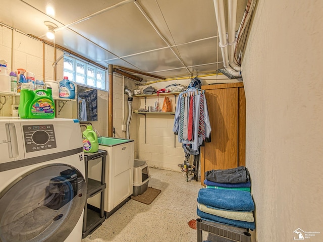 1405 Arbor Ave, Monroe, MI 48162 - below grade area featuring washer / clothes dryer, tile patterned floors, and concrete block wall
