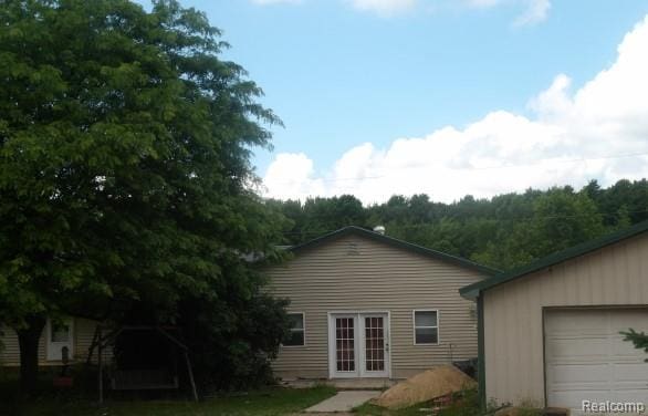 2915 Voice Rd, Kingsley, MI 49649 - rear view of property with french doors