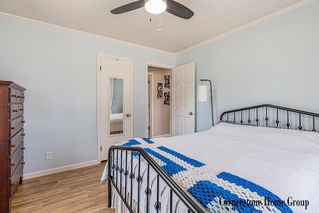 8611 Byron Center Ave SW, Byron Center, MI 49315 - bedroom with wood finished floors, crown molding, and ceiling fan