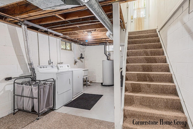 8611 Byron Center Ave SW, Byron Center, MI 49315 - basement with gas water heater, washer and clothes dryer, and stairs