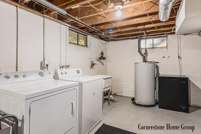 8611 Byron Center Ave SW, Byron Center, MI 49315 - laundry area featuring water heater and separate washer and dryer