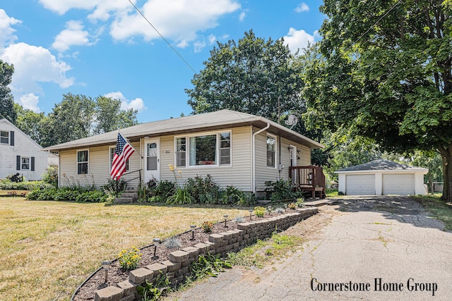 8611 Byron Center Ave SW, Byron Center, MI 49315 - view of front facade featuring an outdoor structure, a garage, and a front yard