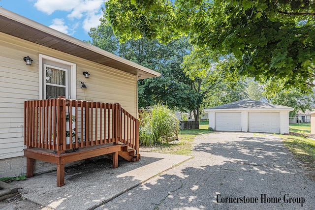 8611 Byron Center Ave SW, Byron Center, MI 49315 - exterior space with a garage, an outdoor structure, and a deck