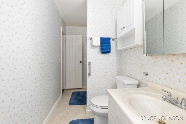 1236 S Van Bruggen Dr, Plainwell, MI 49080 - bathroom with tile patterned floors, vanity, and wallpapered walls