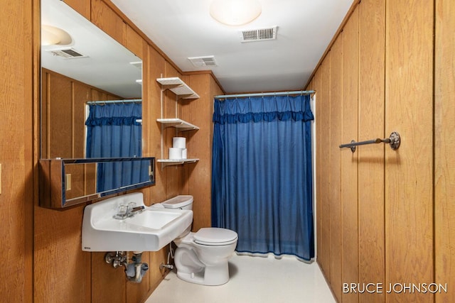 1236 S Van Bruggen Dr, Plainwell, MI 49080 - full bath featuring wood walls and curtained shower