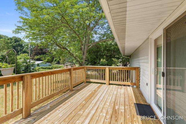 1236 S Van Bruggen Dr, Plainwell, MI 49080 - wooden deck featuring view of wooded area