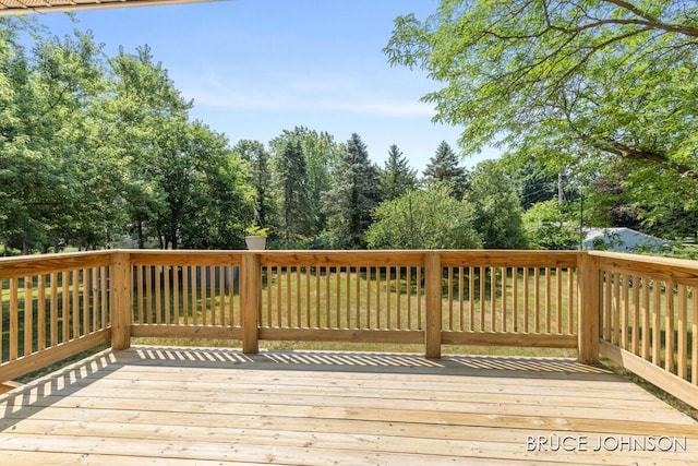 1236 S Van Bruggen Dr, Plainwell, MI 49080 - wooden terrace featuring view of scattered trees