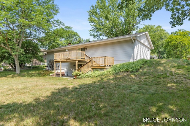 1236 S Van Bruggen Dr, Plainwell, MI 49080 - back of house featuring stairs, a deck, and a lawn