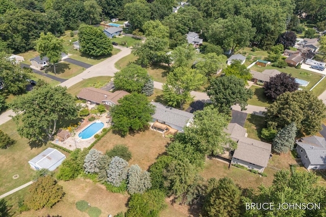 1236 S Van Bruggen Dr, Plainwell, MI 49080 - aerial view of property and surrounding area with a pool area and nearby suburban area
