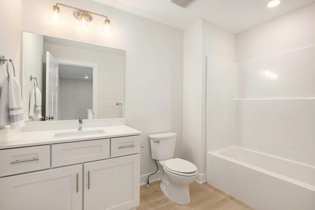 4818 Hidden River Ave SW Unit 51, Wyoming, MI 49418 - full bathroom featuring wood finished floors, vanity, and shower / bath combination