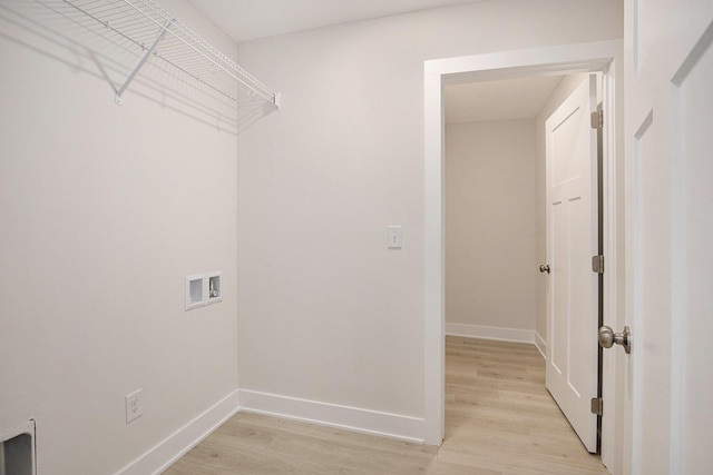 4818 Hidden River Ave SW Unit 51, Wyoming, MI 49418 - washroom featuring washer hookup and light wood-type flooring