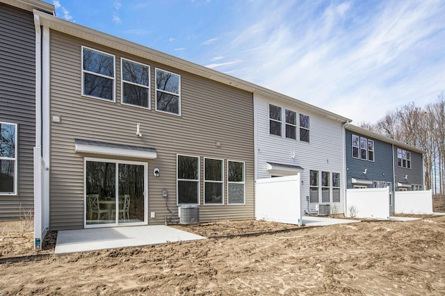 4818 Hidden River Ave SW Unit 51, Wyoming, MI 49418 - rear view of property with a patio