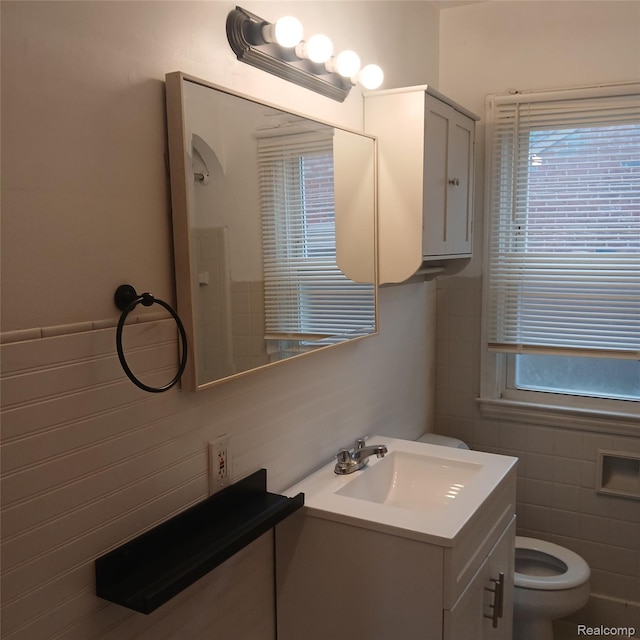 19145 Fielding St, Detroit, MI 48219 - bathroom featuring tile walls and vanity
