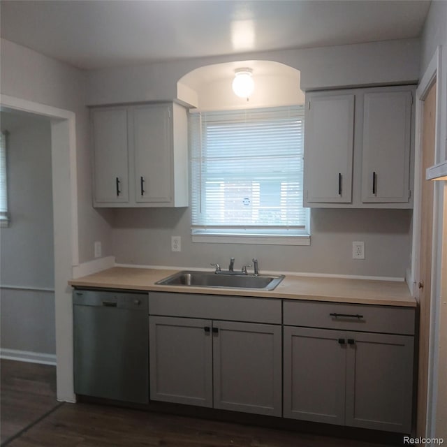 19145 Fielding St, Detroit, MI 48219 - kitchen featuring dishwashing machine, light countertops, dark wood-style flooring, and gray cabinetry