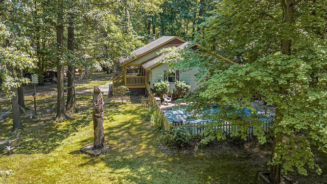 16253 1st Ln, Union Pier, MI 49129 - view of green lawn with a wooden deck