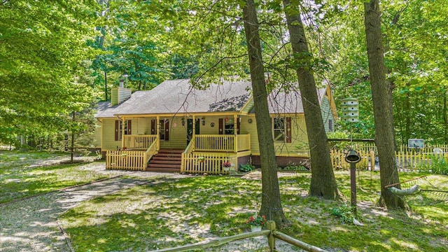 16253 1st Ln, Union Pier, MI 49129 - view of front of property with covered porch and a chimney