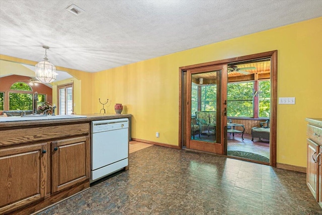 16253 1st Ln, Union Pier, MI 49129 - kitchen with dishwasher, healthy amount of natural light, a chandelier, pendant lighting, and a textured ceiling