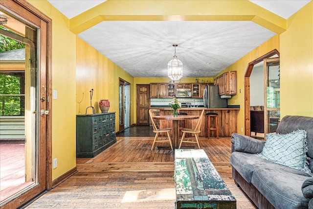 16253 1st Ln, Union Pier, MI 49129 - living area featuring dark wood finished floors and arched walkways