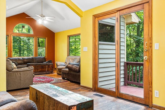 16253 1st Ln, Union Pier, MI 49129 - living area featuring vaulted ceiling, wood finished floors, and a ceiling fan