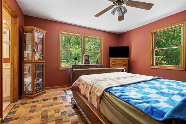 16253 1st Ln, Union Pier, MI 49129 - bedroom featuring a ceiling fan and baseboards