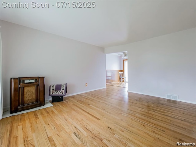 32508 Avondale St, Westland, MI 48186 - unfurnished living room with wood finished floors and baseboards