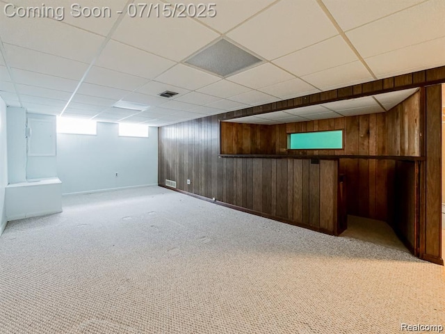 32508 Avondale St, Westland, MI 48186 - below grade area featuring wood walls, carpet floors, a paneled ceiling, and electric panel