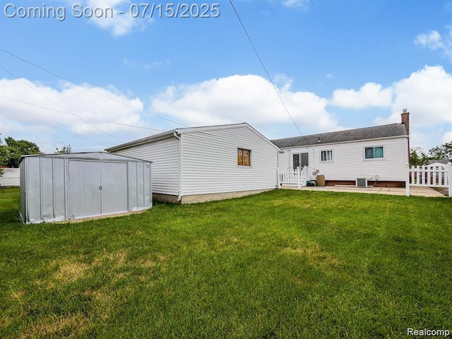 32508 Avondale St, Westland, MI 48186 - rear view of house featuring a shed and a chimney