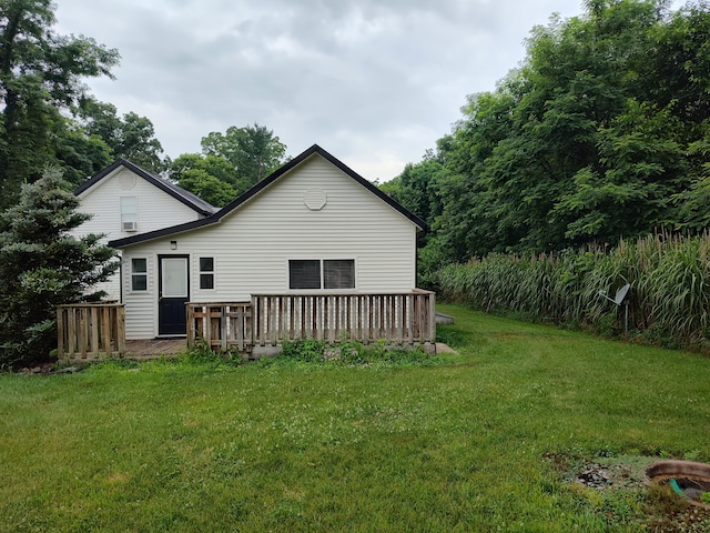411 Block Rd, Coldwater, MI 49036 - rear view of property featuring a wooden deck and a yard