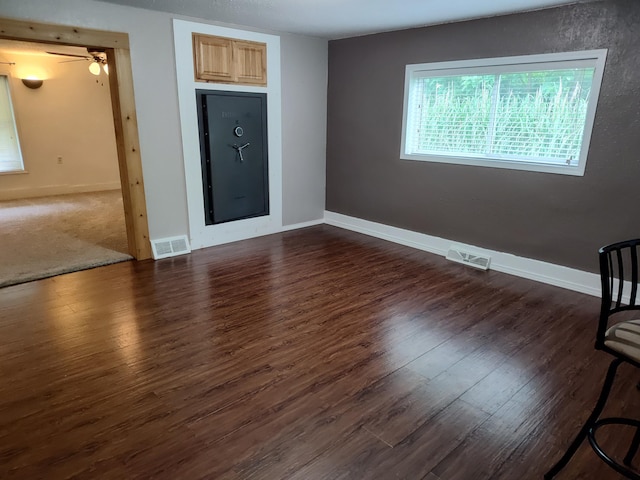 411 Block Rd, Coldwater, MI 49036 - unfurnished living room featuring dark wood finished floors and baseboards