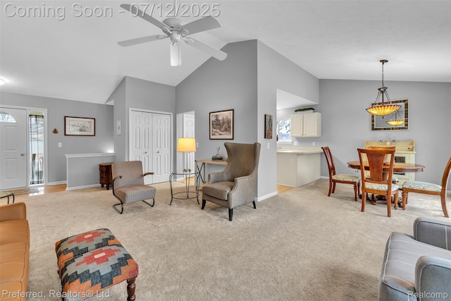 77 Sedum, Howell, MI 48843 - living area with light colored carpet, lofted ceiling, and a ceiling fan