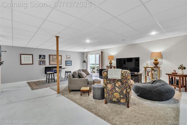 77 Sedum, Howell, MI 48843 - living area with finished concrete floors, a drop ceiling, and recessed lighting