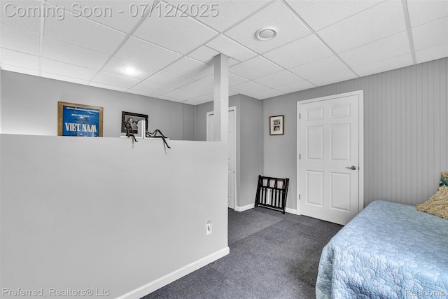 77 Sedum, Howell, MI 48843 - bedroom featuring dark colored carpet, a paneled ceiling, and recessed lighting