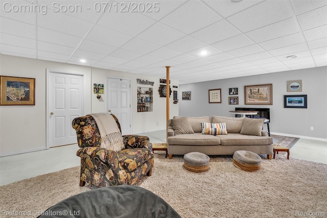 77 Sedum, Howell, MI 48843 - living area featuring a paneled ceiling and recessed lighting