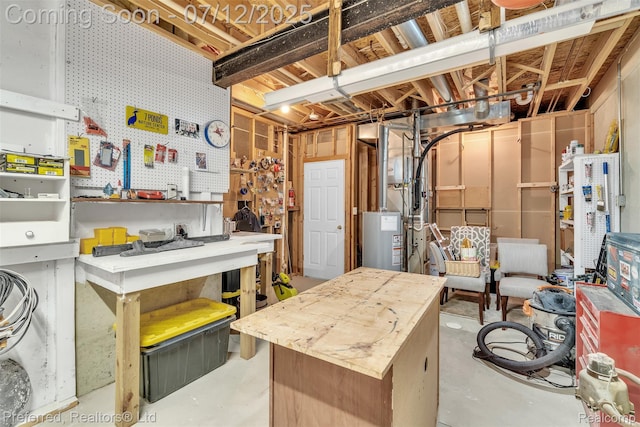 77 Sedum, Howell, MI 48843 - unfinished below grade area with water heater and a workshop area