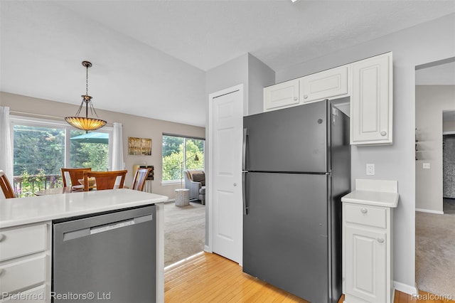 77 Sedum, Howell, MI 48843 - kitchen with freestanding refrigerator, dishwasher, white cabinets, light wood-style flooring, and light countertops