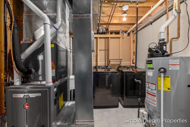1026 Coldbrook St NE, Grand Rapids, MI 49503 - utilities with gas water heater, washing machine and dryer, and heating unit