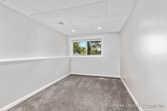 1026 Coldbrook St NE, Grand Rapids, MI 49503 - empty room featuring a drop ceiling, carpet flooring, and recessed lighting