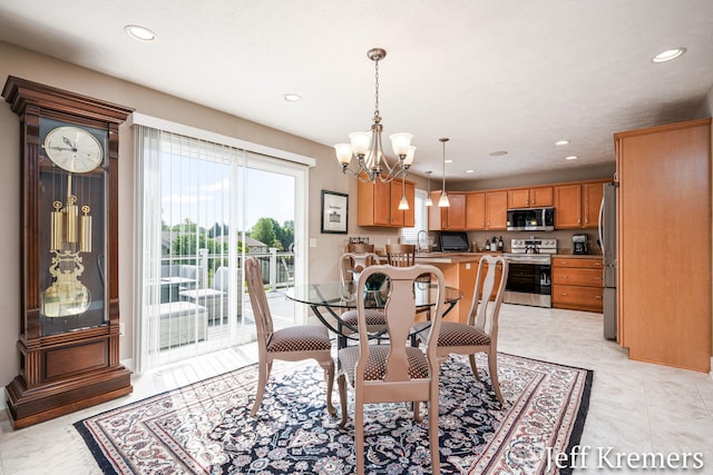 5692 Nile Dr SW, Wyoming, MI 49418 - dining space with recessed lighting and a chandelier