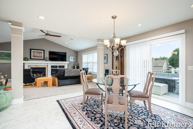 5692 Nile Dr SW, Wyoming, MI 49418 - dining area featuring ceiling fan, a fireplace, recessed lighting, a chandelier, and decorative columns